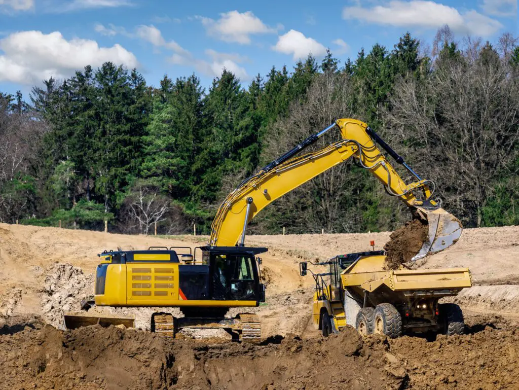 Yellow earth mover at a construction site